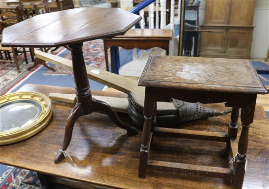 A 19th century oak octagonal tilt-top table and an oak stool